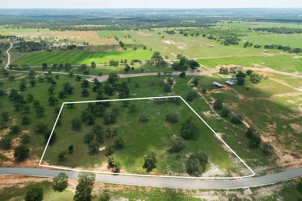 a view of a garden from a balcony