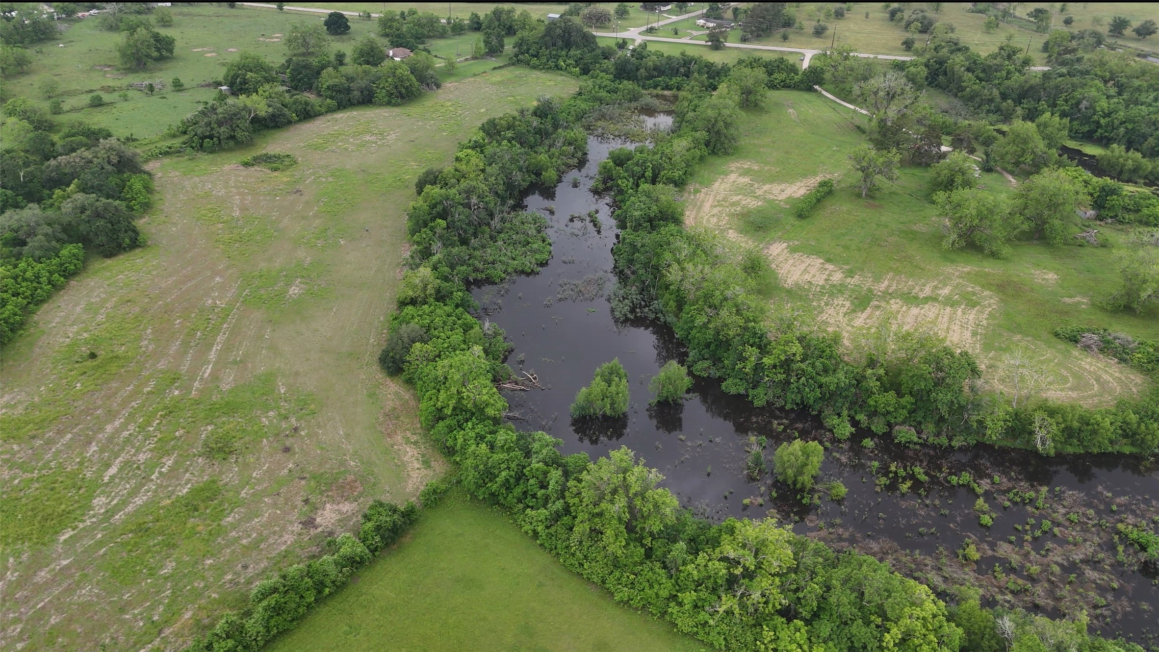 2627 FM 524 Road Sweeny, TX 77480 - Photo 5 of 9 an aerial view of residential houses with outdoor space and trees