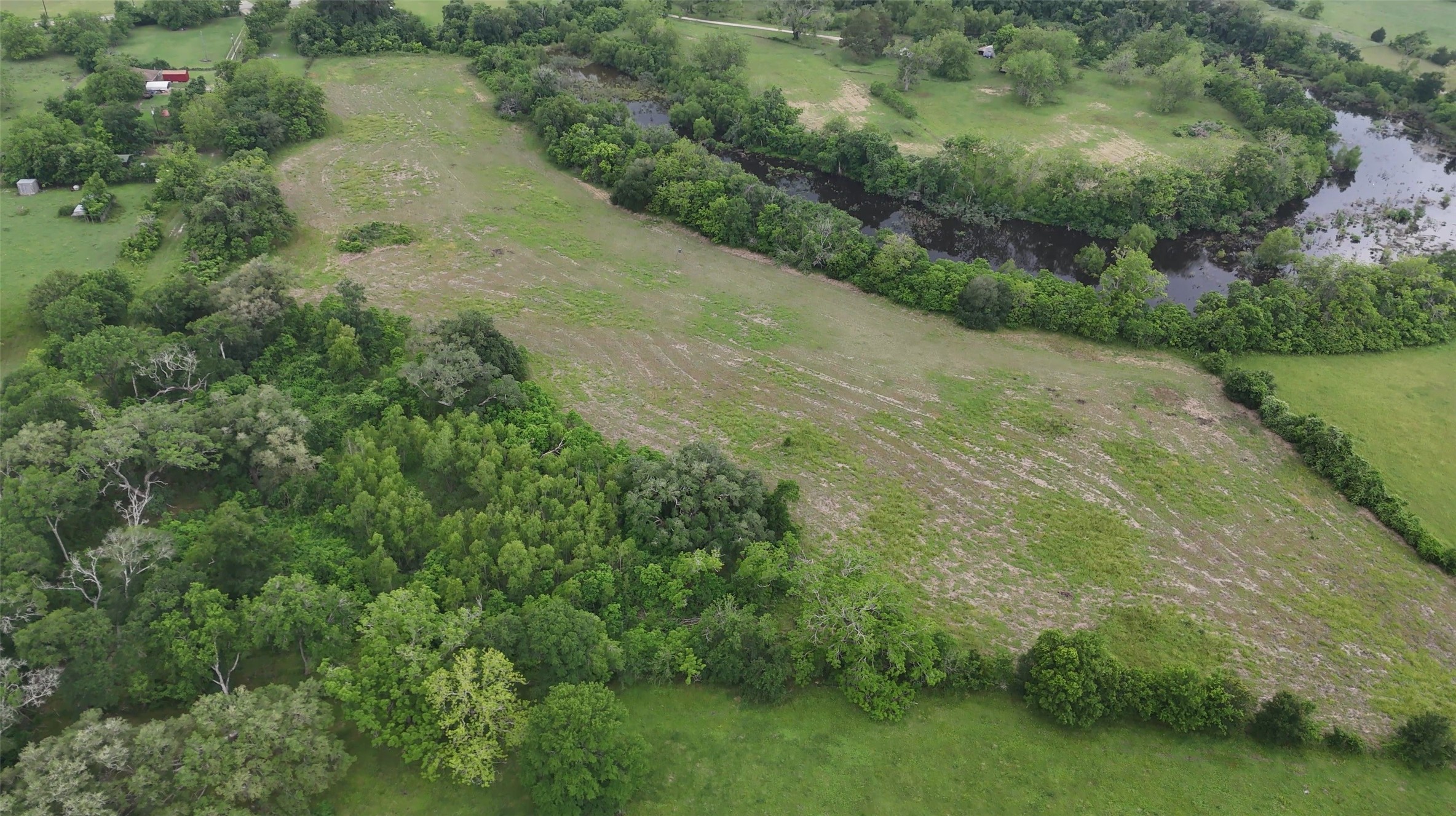 2627 FM 524 Road Sweeny, TX 77480 - Photo 6 of 9 an aerial view of residential houses with outdoor space and trees