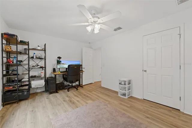 a view of a workspace with furniture