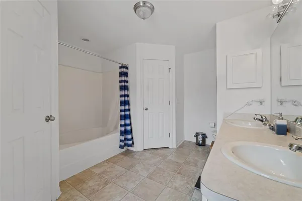 a bathroom with a sink and a bathtub