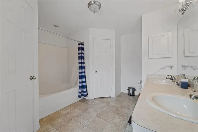 a bathroom with a sink and a bathtub