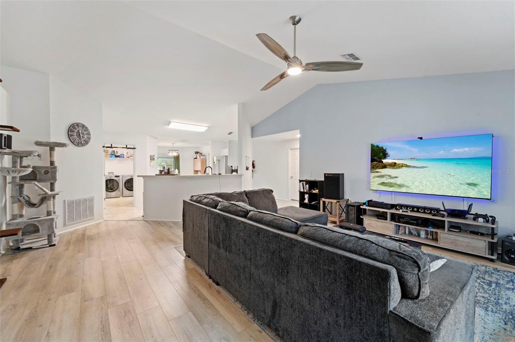 199 Linder Drive Homosassa, FL 34446 - Photo 25 of 29 a living room with furniture and a flat screen tv