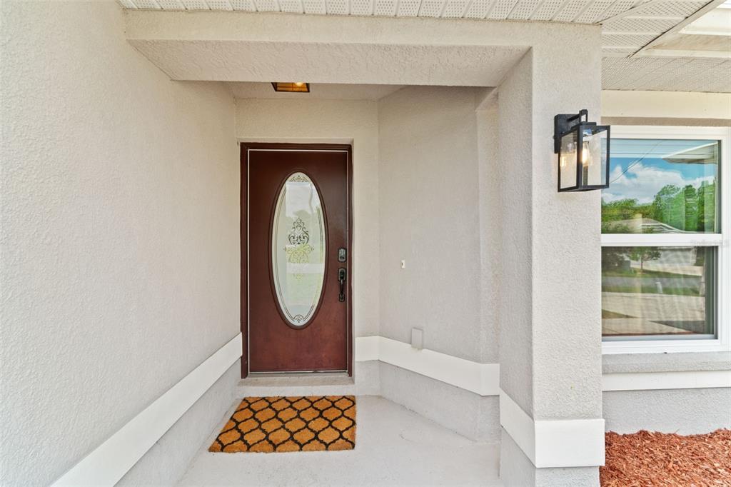 199 Linder Drive Homosassa, FL 34446 - Photo 3 of 29 a bathroom with a tub and a window