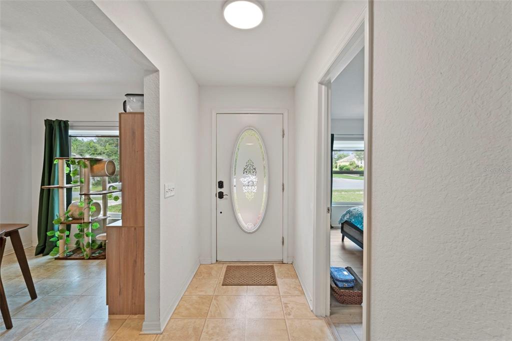 199 Linder Drive Homosassa, FL 34446 - Photo 4 of 29 wooden floor in a room with a window