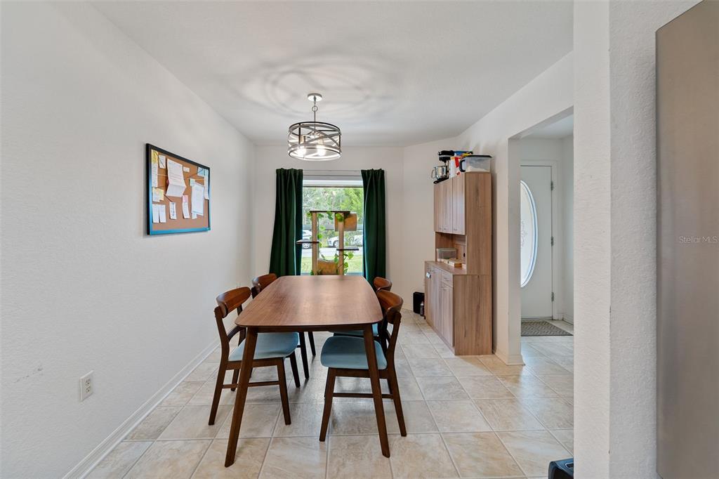 199 Linder Drive Homosassa, FL 34446 - Photo 5 of 29 a view of a dining room with furniture and window