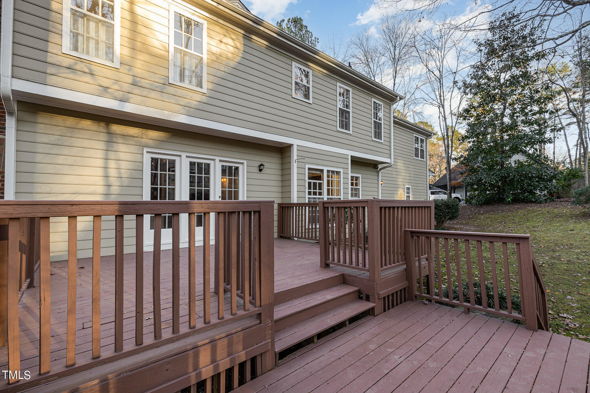 7905 Farnham Court Raleigh, NC 27615 - Photo 2 of 28 a view of a house with a wooden deck