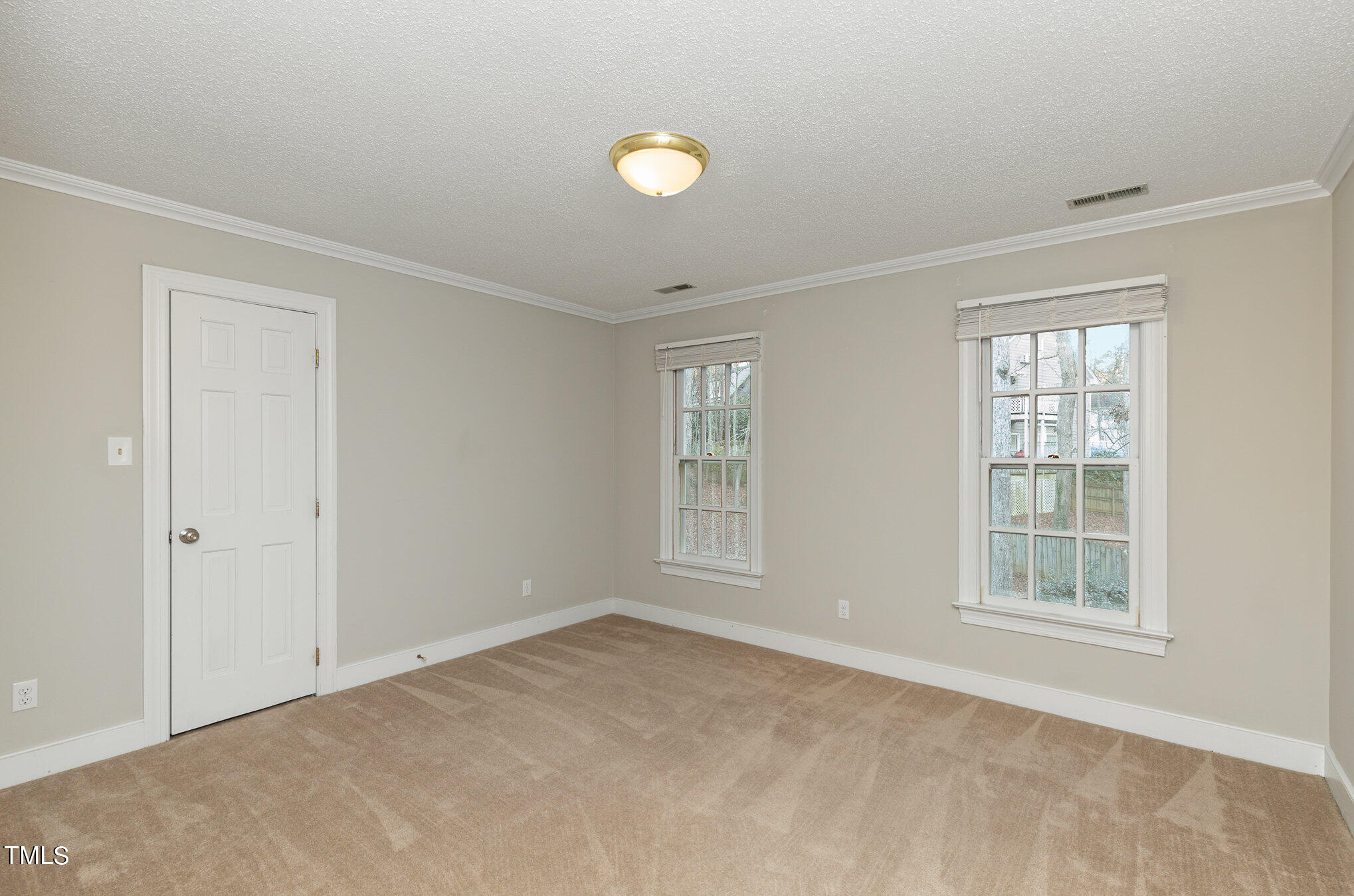 7905 Farnham Court Raleigh, NC 27615 - Photo 23 of 28 a view of an empty room with a window