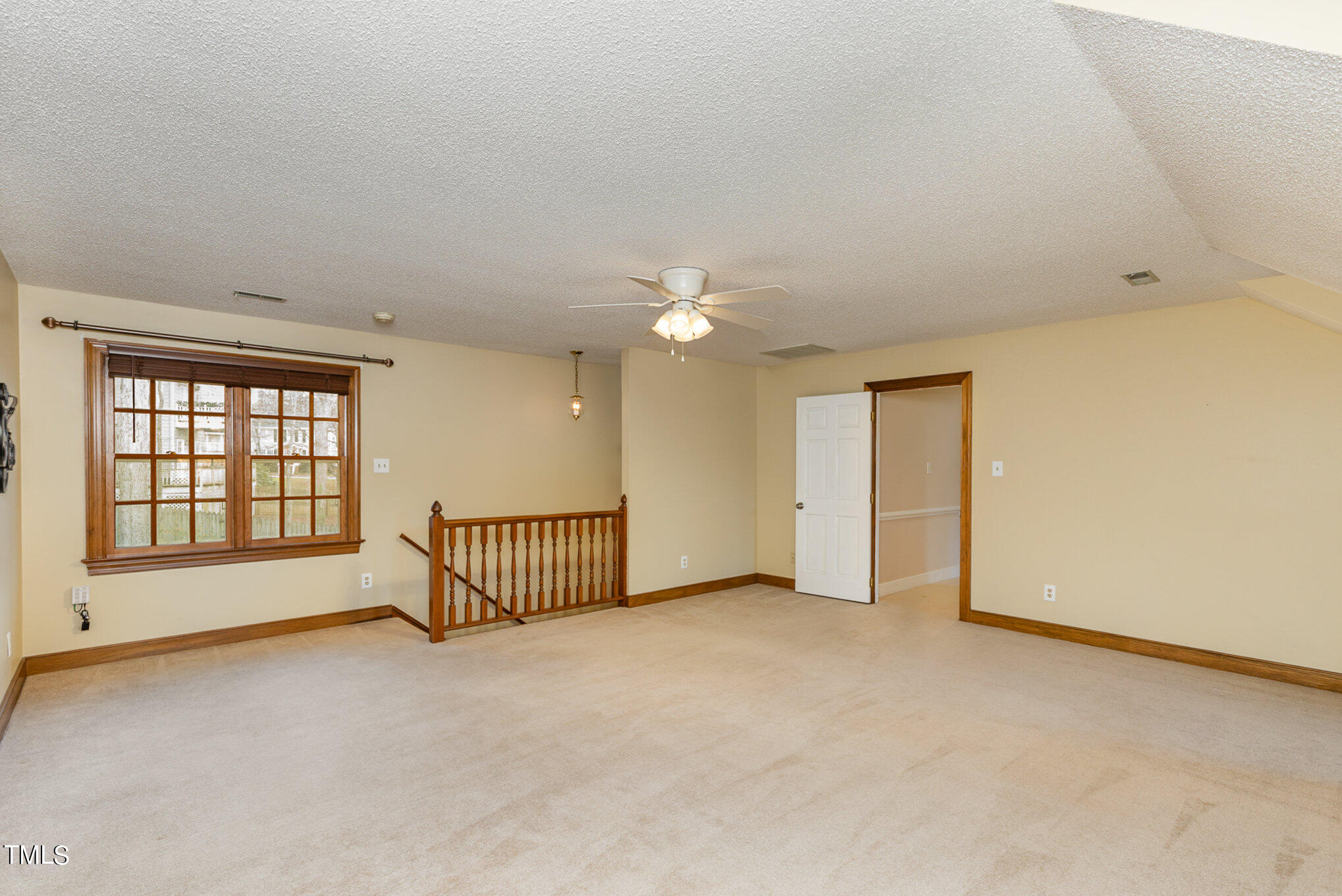 7905 Farnham Court Raleigh, NC 27615 - Photo 26 of 28 a view of an empty room with a window
