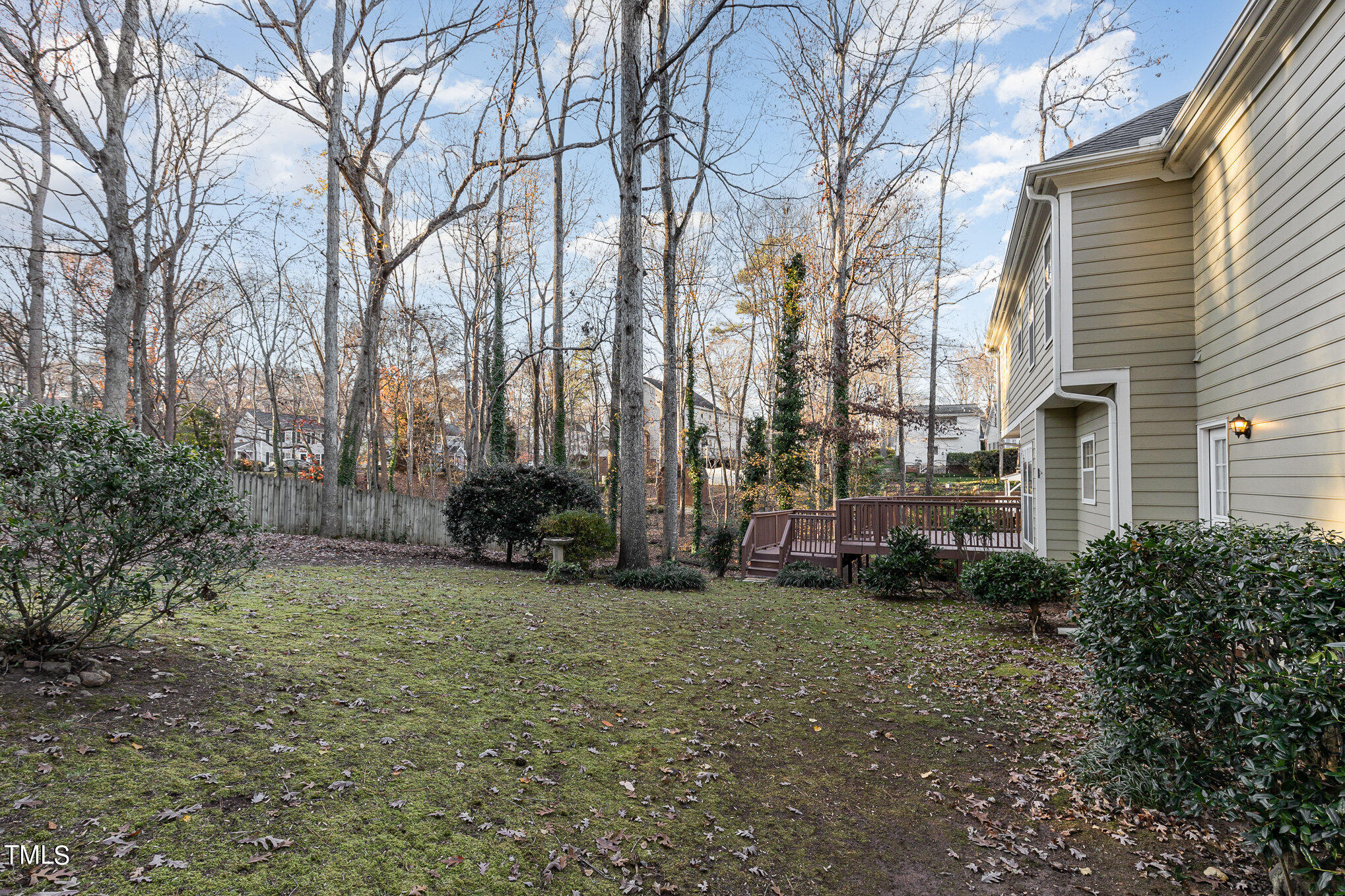 7905 Farnham Court Raleigh, NC 27615 - Photo 27 of 28 a view of a yard with trees in front of it