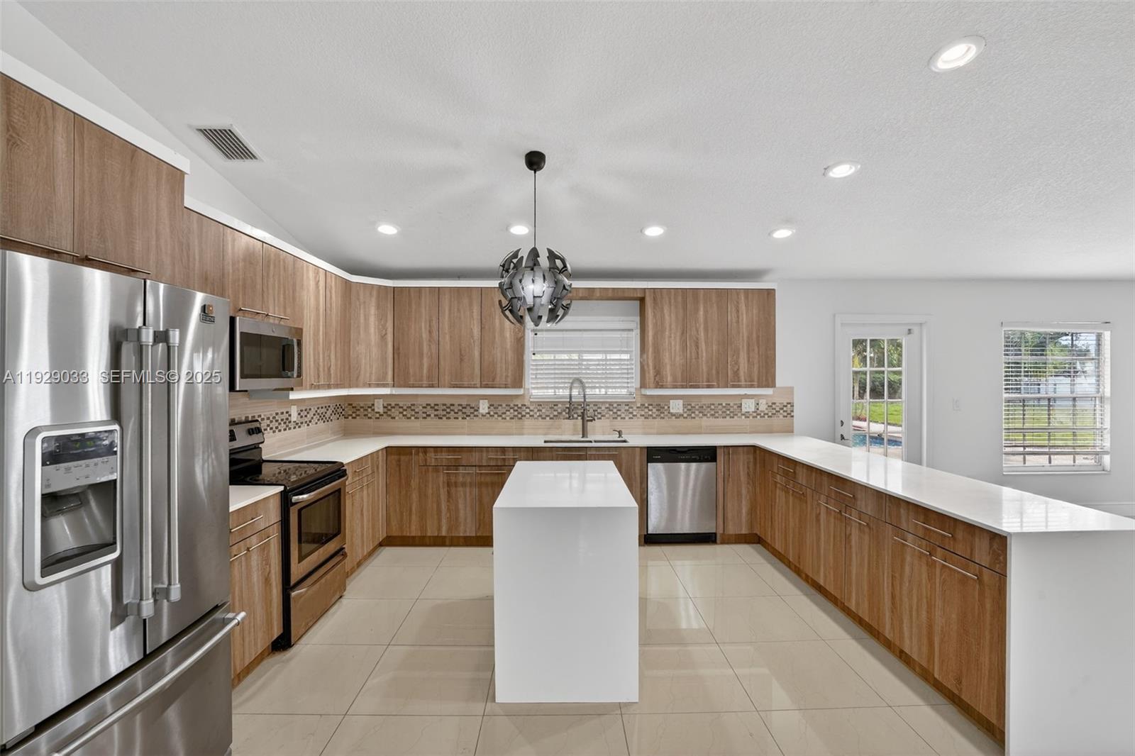 21080 Southwest 242nd Street Homestead, FL 33031 - Photo 12 of 37 a kitchen with lots of counter top space