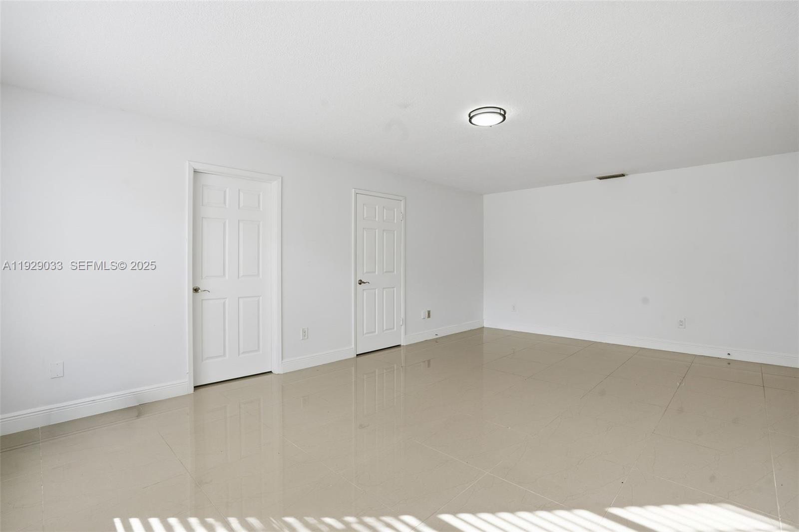 21080 Southwest 242nd Street Homestead, FL 33031 - Photo 13 of 37 a view of an empty room