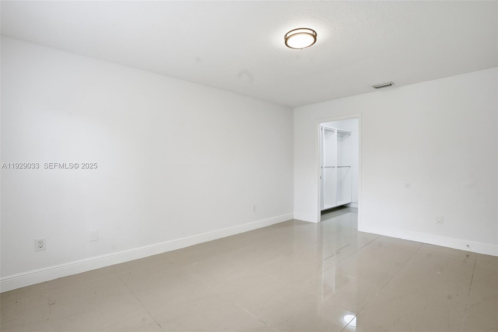 21080 Southwest 242nd Street Homestead, FL 33031 - Photo 23 of 37 a view of an empty room