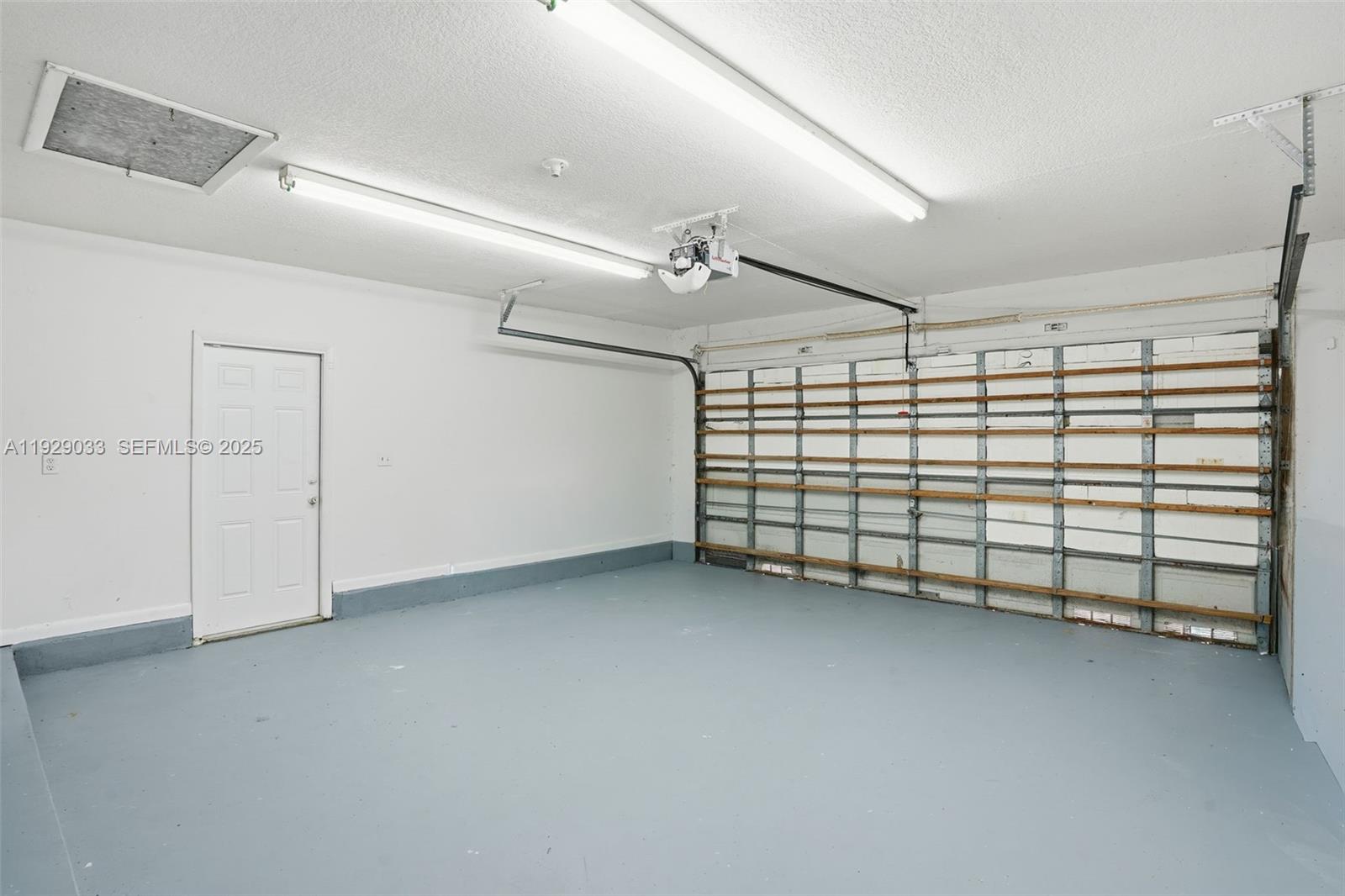 21080 Southwest 242nd Street Homestead, FL 33031 - Photo 28 of 37 a view of a garage