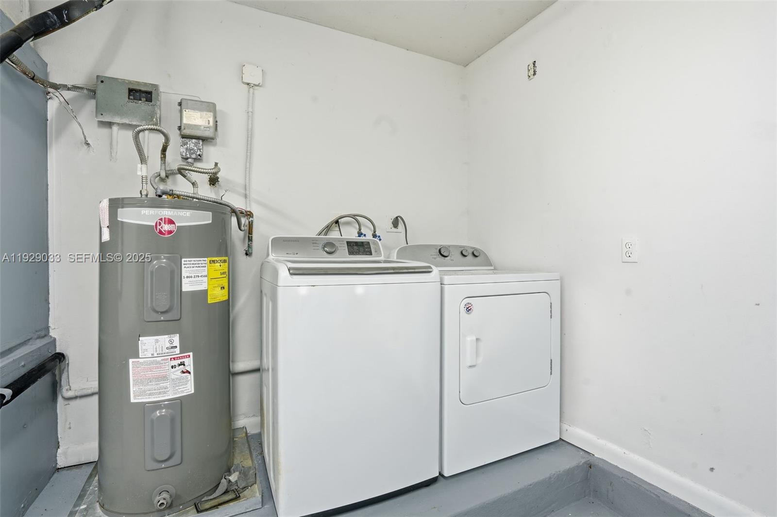 21080 Southwest 242nd Street Homestead, FL 33031 - Photo 29 of 37 a utility room with dryer and washer