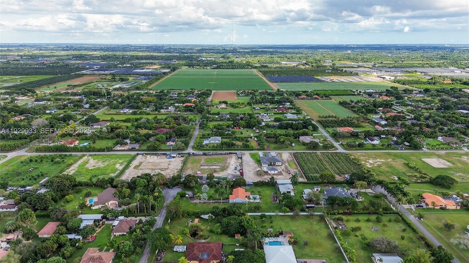 21080 Southwest 242nd Street Homestead, FL 33031 - Photo 34 of 37 a view of lake with green space