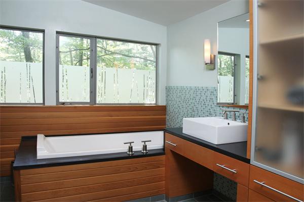 11 Dewey Road Lexington, MA 02420 - Photo 6 of 9 a bathroom with a sink and a bathtub