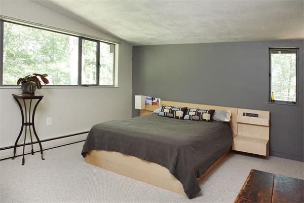 11 Dewey Road Lexington, MA 02420 - Photo 7 of 9 a bedroom with a bed and window