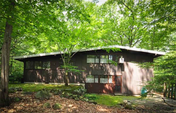 11 Dewey Road Lexington, MA 02420 - Photo 9 of 9 a view of a tiny house with a yard