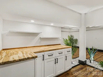 a view of a entryway with wooden floor