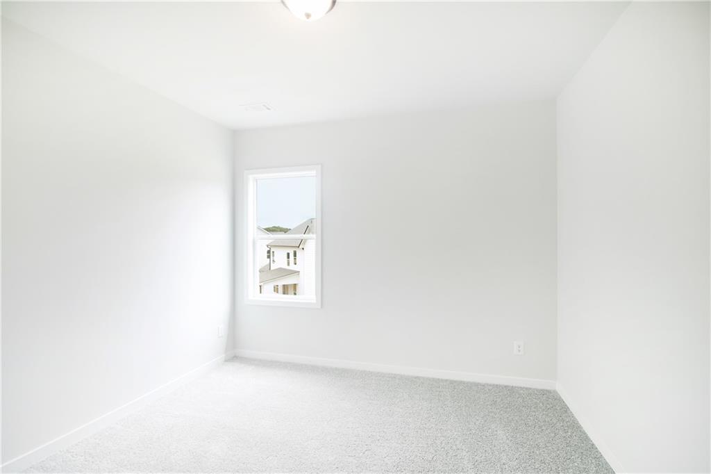 163 Wingate Drive Winder, GA 30680 - Photo 21 of 79 a view of an empty room