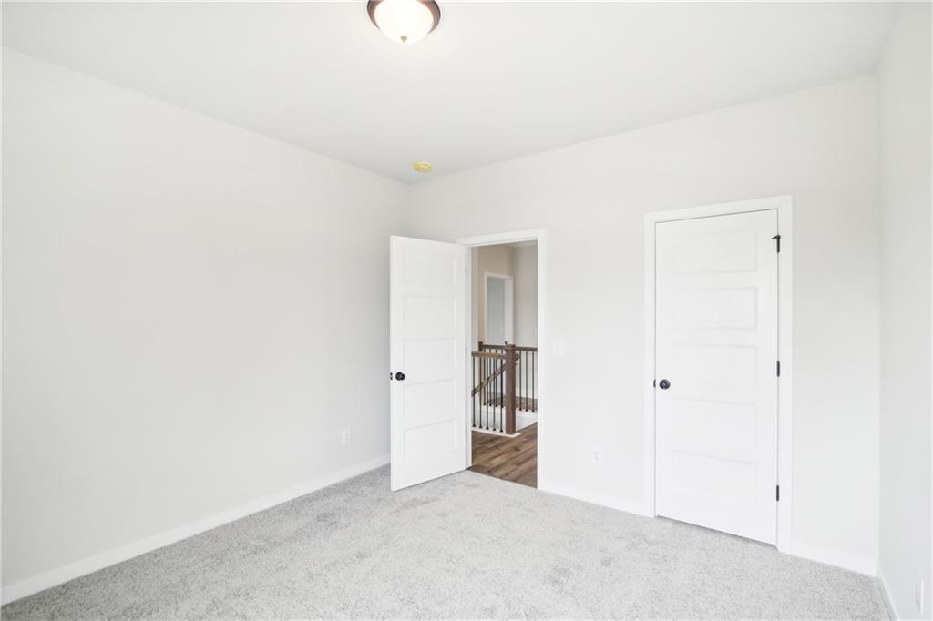 163 Wingate Drive Winder, GA 30680 - Photo 22 of 79 a view of an empty room