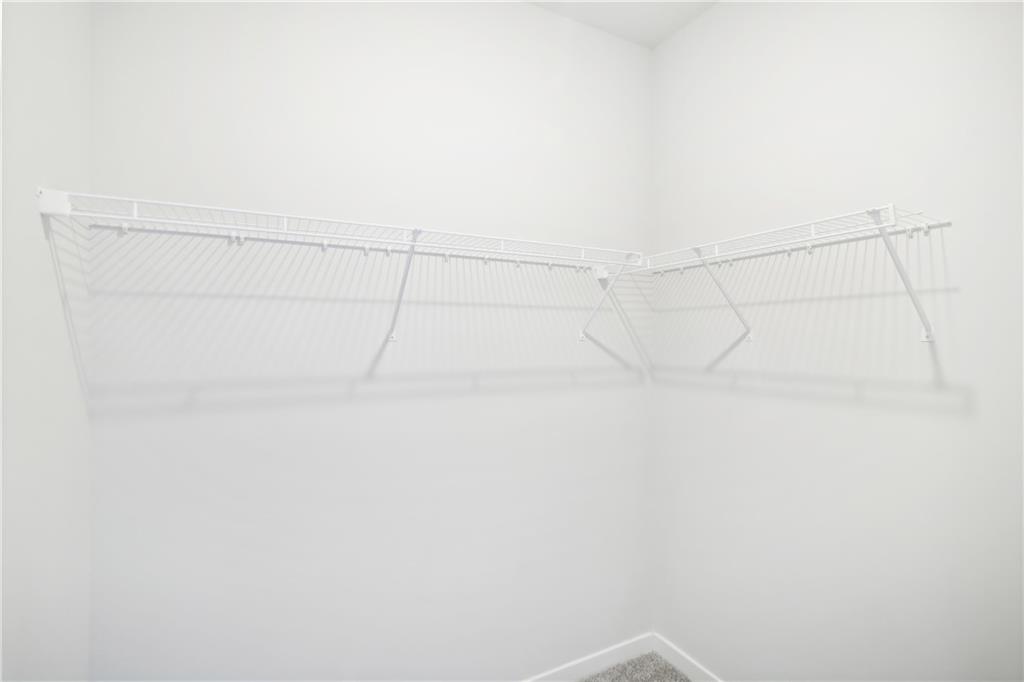 163 Wingate Drive Winder, GA 30680 - Photo 25 of 79 a view of a rack on the wall