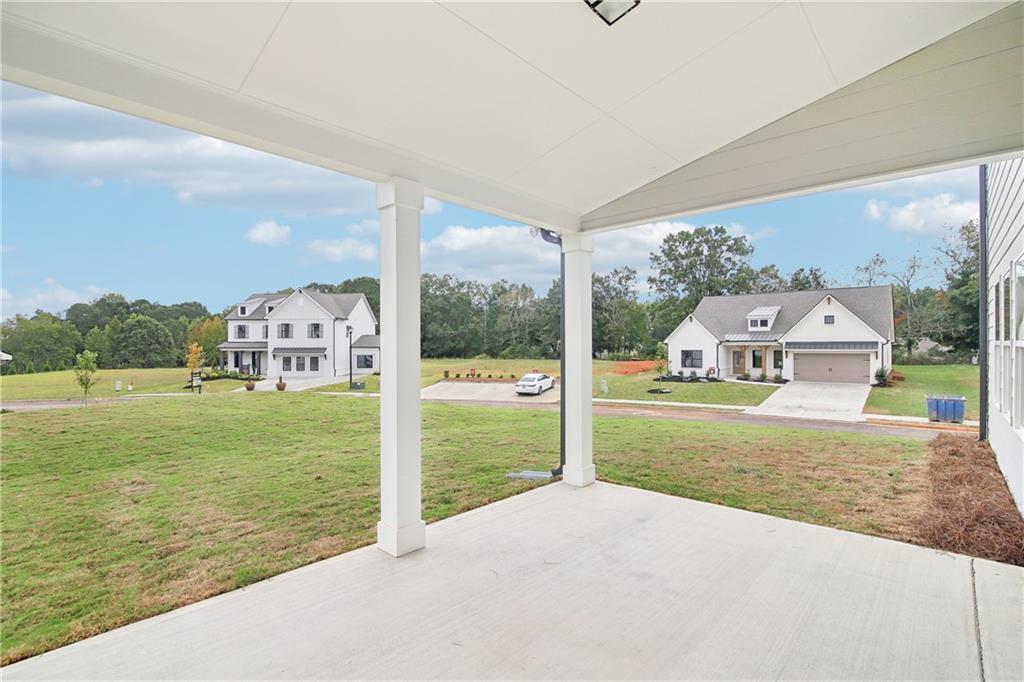 163 Wingate Drive Winder, GA 30680 - Photo 33 of 79 a view of a house with a yard and a fountain