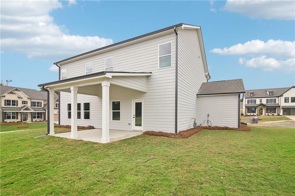 163 Wingate Drive Winder, GA 30680 - Photo 36 of 79 a front view of a house with a yard