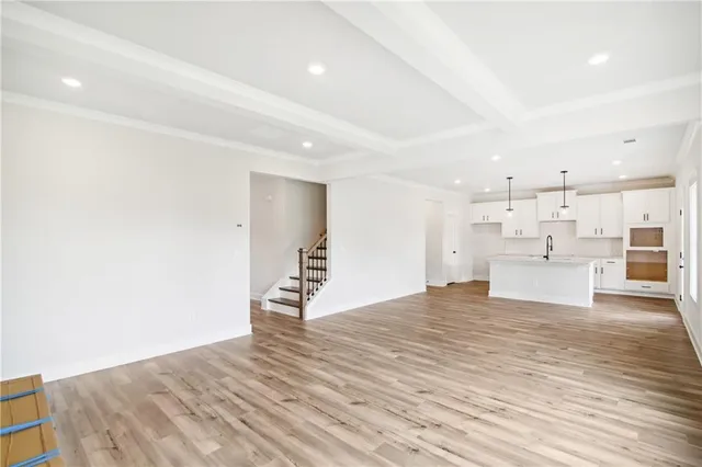 a view of kitchen with wooden floor