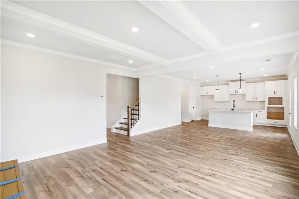 163 Wingate Drive Winder, GA 30680 - Photo 7 of 79 a view of kitchen with wooden floor