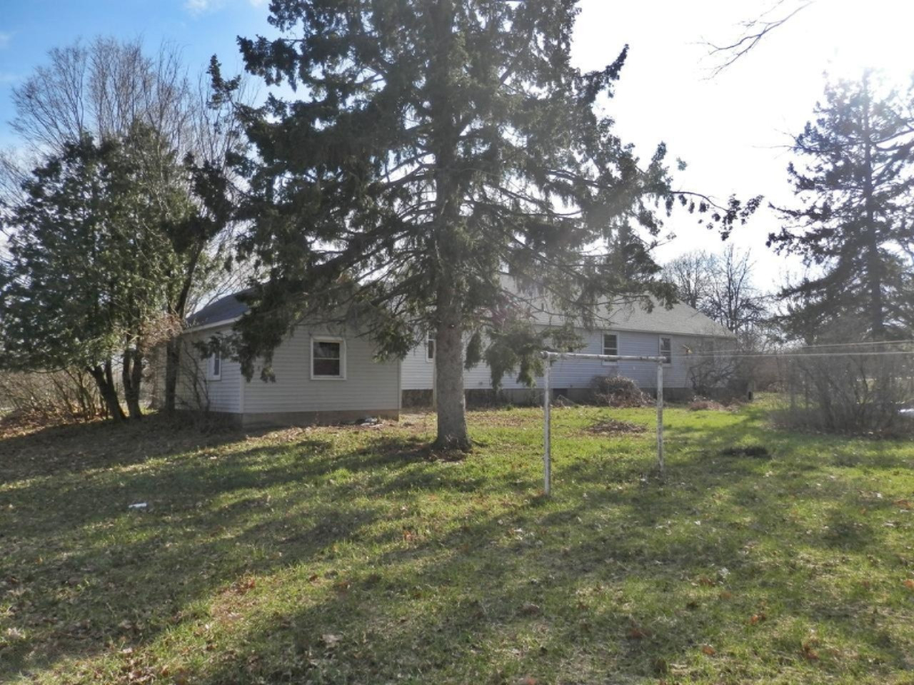 11626 Tannerville Road Kaleva, MI 49645 - Photo 25 of 35 Back view of house