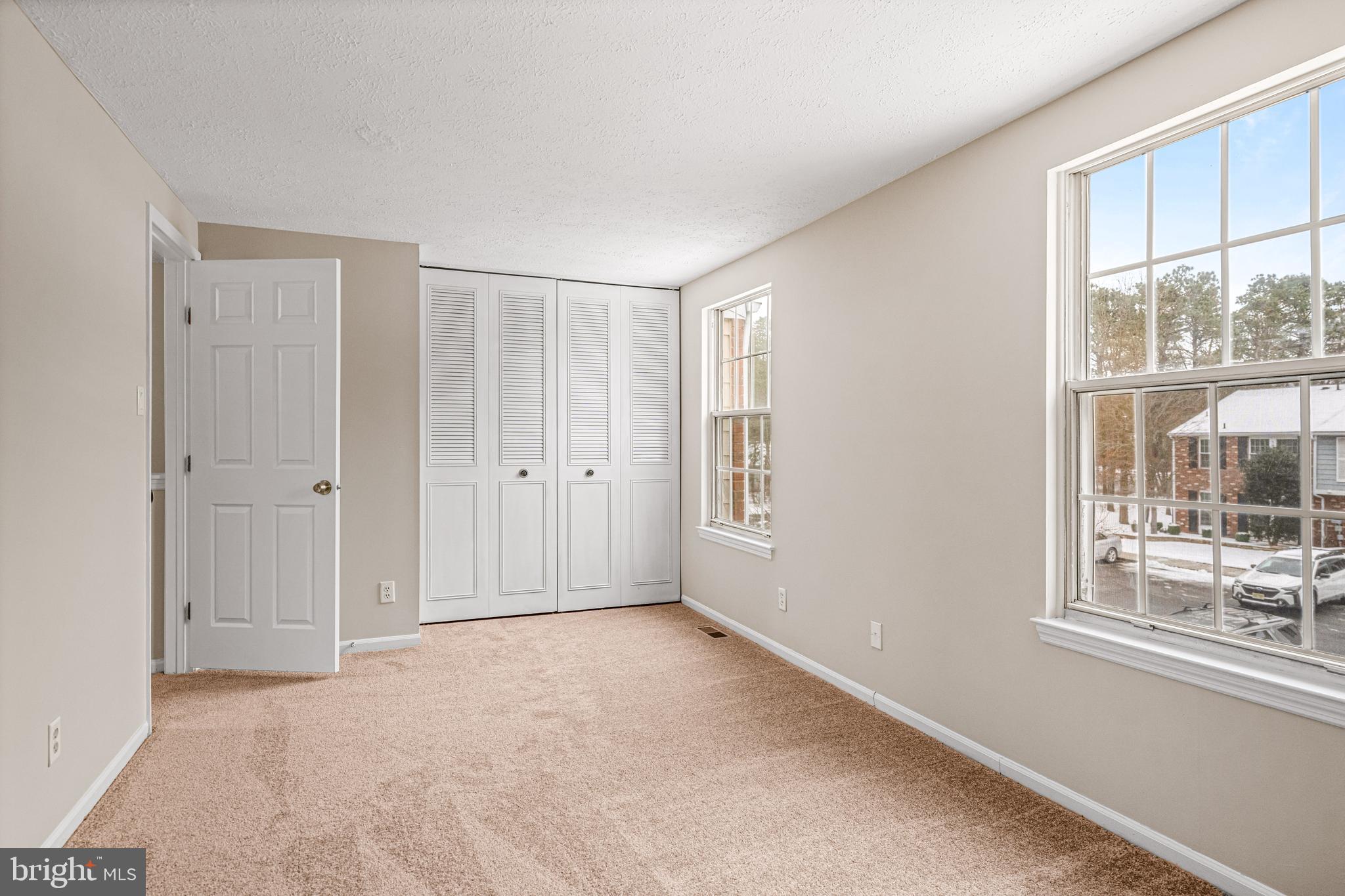 67 Dorchester Circle Marlton, NJ 08053 - Photo 11 of 25 a view of an empty room with a window