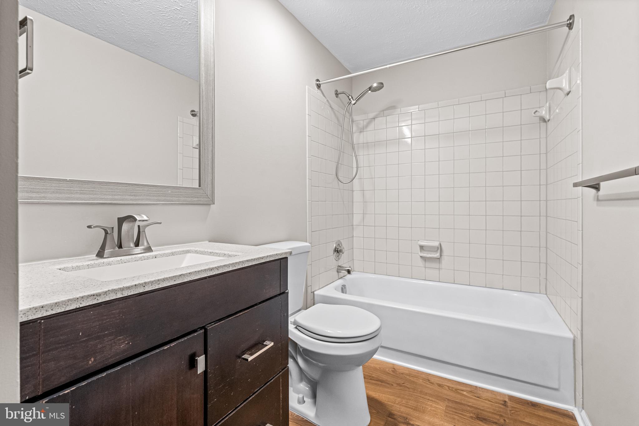 67 Dorchester Circle Marlton, NJ 08053 - Photo 15 of 25 a bathroom with a bathtub shower sink vanity mirror and toilet