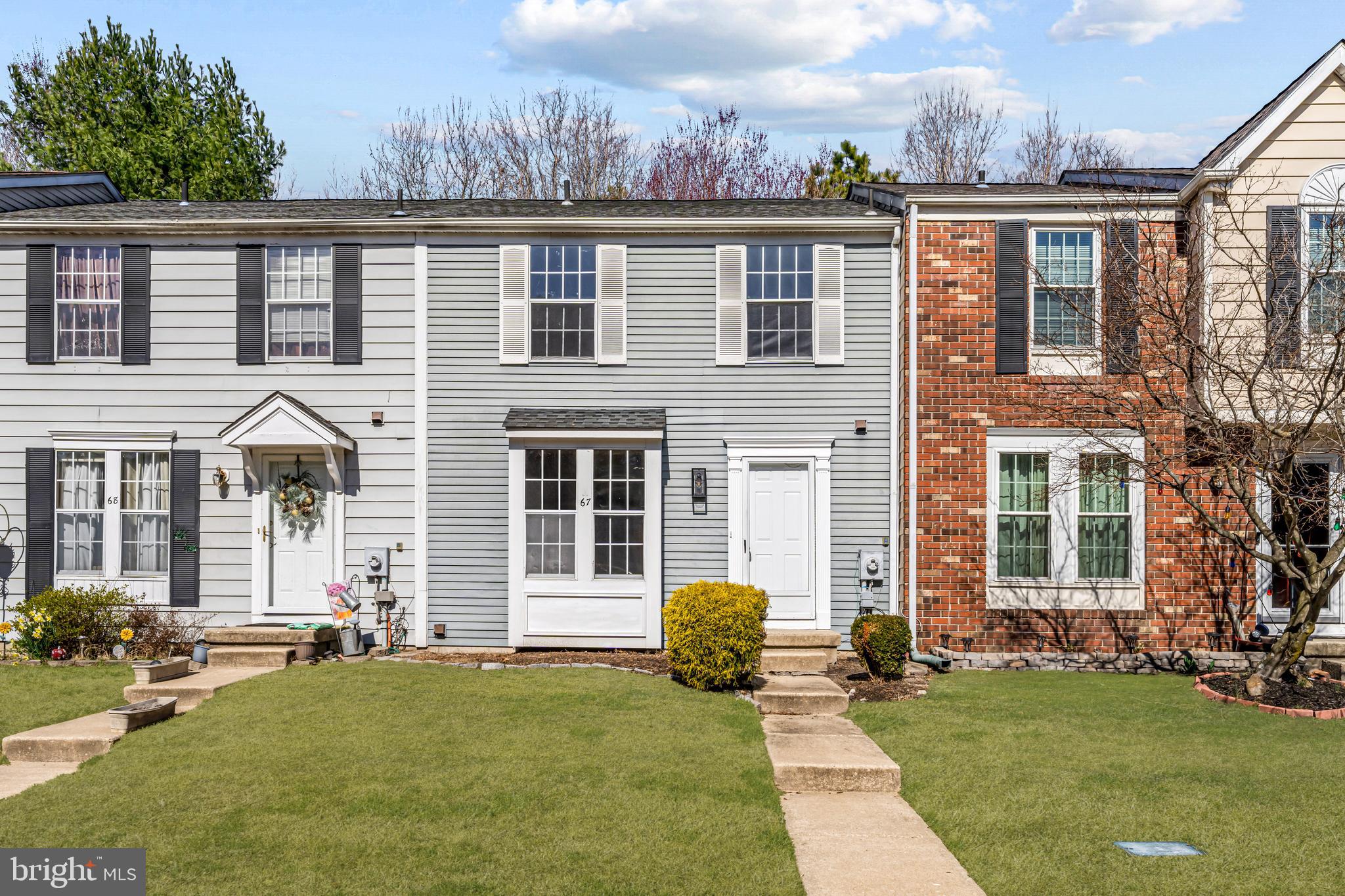 67 Dorchester Circle Marlton, NJ 08053 - Photo 2 of 25 a house view with a garden space