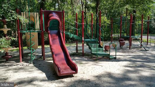 67 Dorchester Circle Marlton, NJ 08053 - Photo 21 of 25 a view of a park with swings and slides
