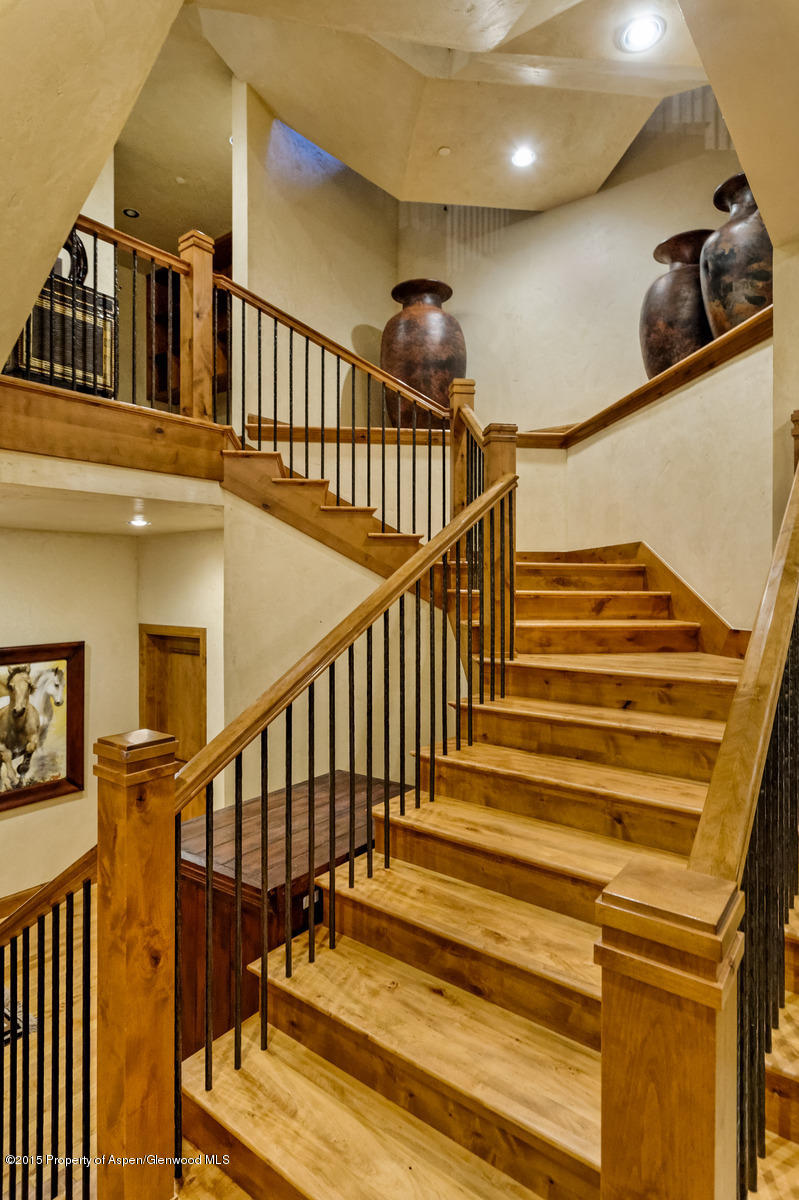 64 Prospector Road, Unit 7 Aspen, CO 81611 - Photo 9 of 23 a view of entryway and hall with wooden floor