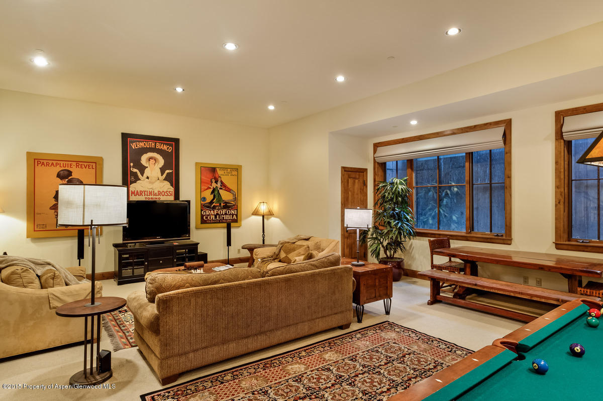 64 Prospector Road, Unit 7 Aspen, CO 81611 - Photo 10 of 23 a room with furniture pool table and window