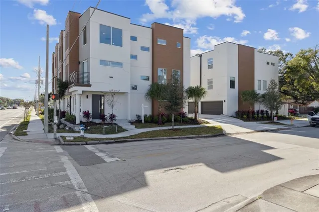 a view of a building with a street