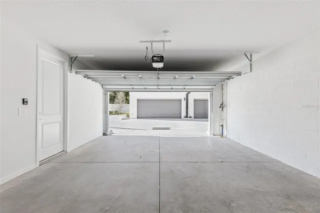 a house with a yard and a large parking space