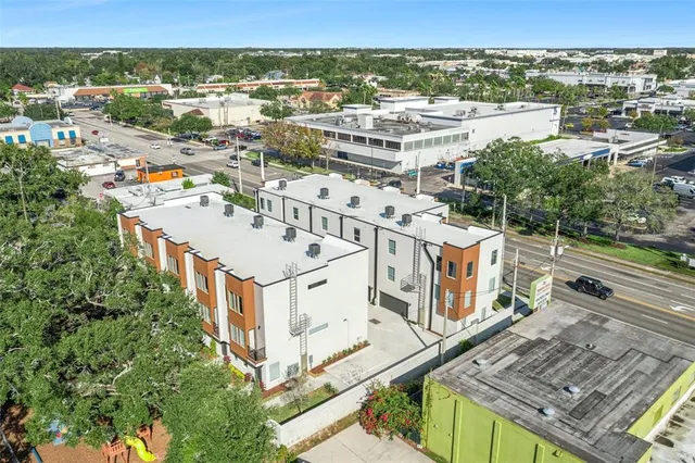 a view of a chairs and table in a patio