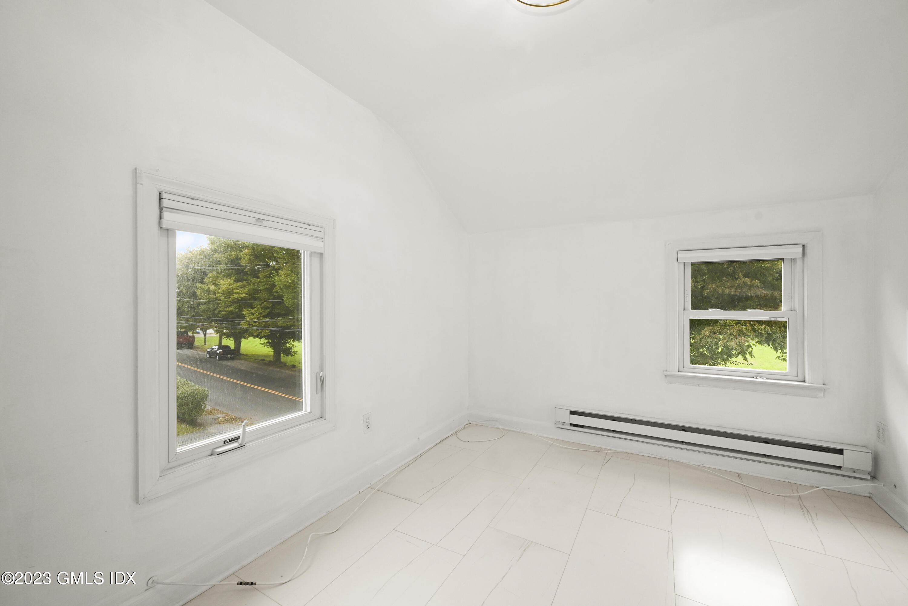39 Bible Street, Unit 2 Cos Cob, CT 06807 - Photo 11 of 15 an empty room with a window