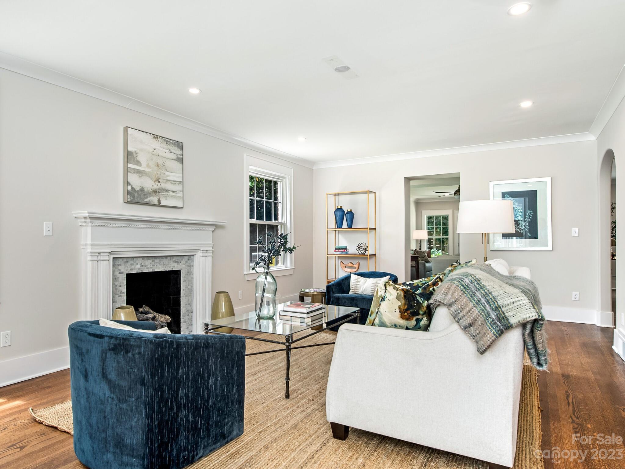 1815 Harris Road Charlotte, NC 28211 - Photo 14 of 32 a living room with furniture and a fireplace