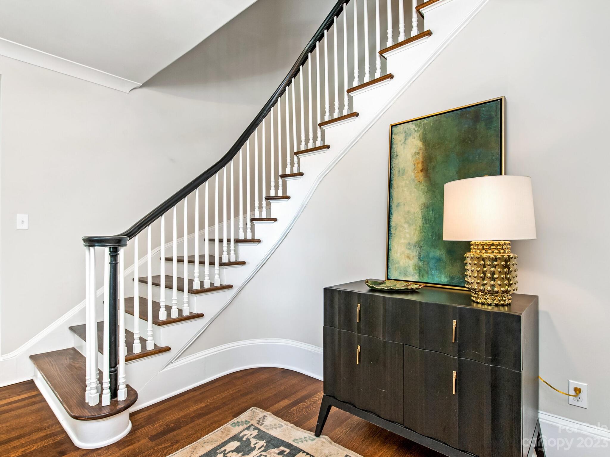 1815 Harris Road Charlotte, NC 28211 - Photo 15 of 32 a view of entryway and hall with wooden floor