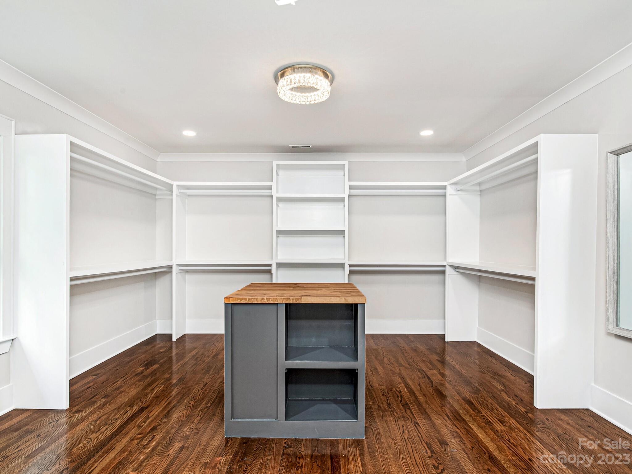 1815 Harris Road Charlotte, NC 28211 - Photo 22 of 32 a room with closet and wooden floor