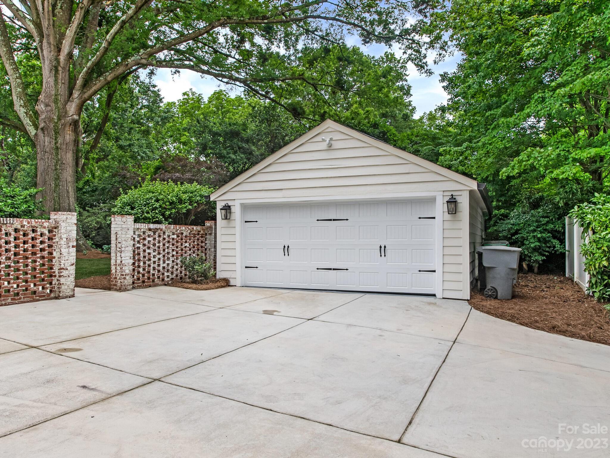 1815 Harris Road Charlotte, NC 28211 - Photo 31 of 32 a front view of a house with a garage