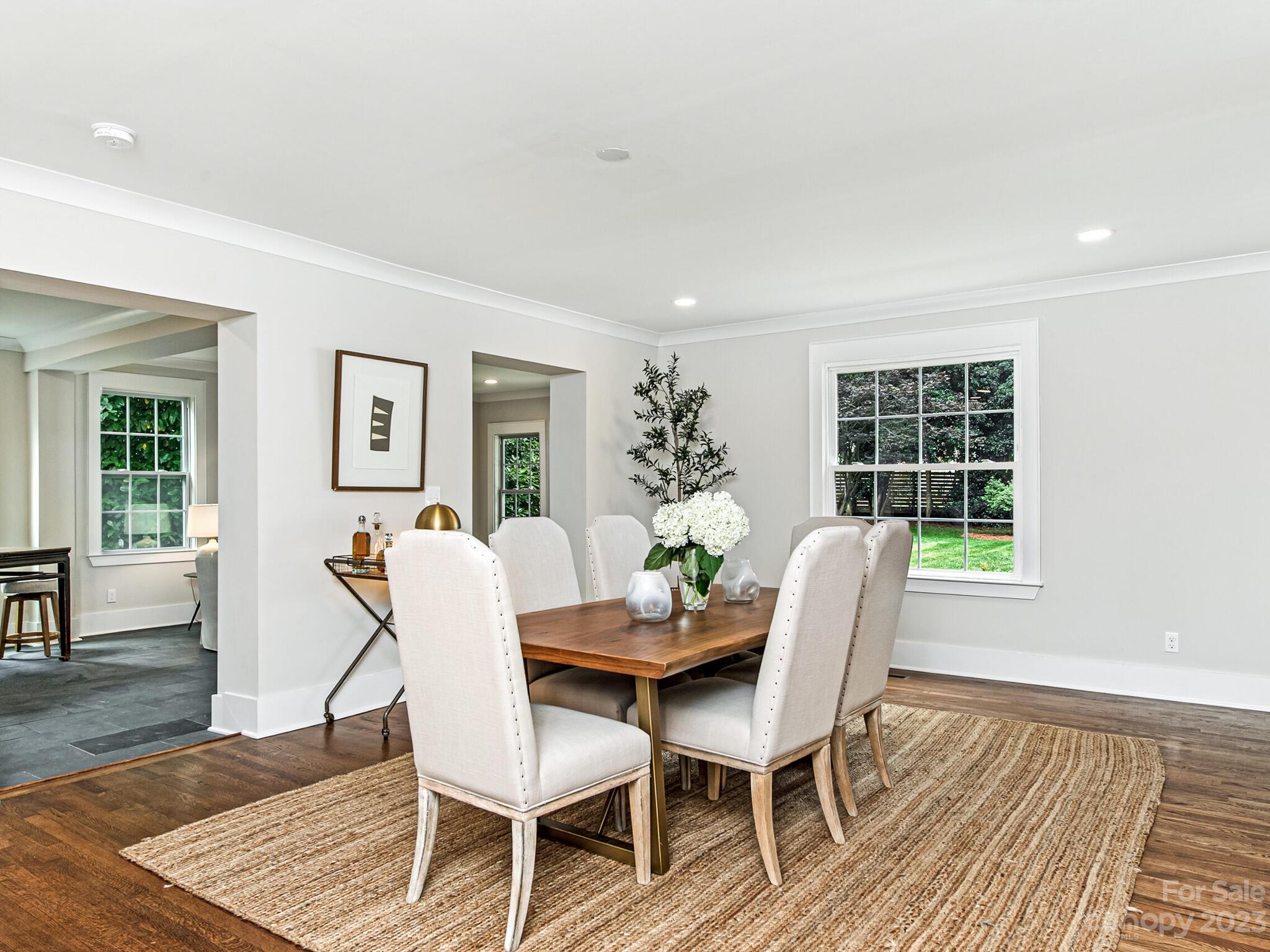 1815 Harris Road Charlotte, NC 28211 - Photo 9 of 32 a dining room with furniture and wooden floor