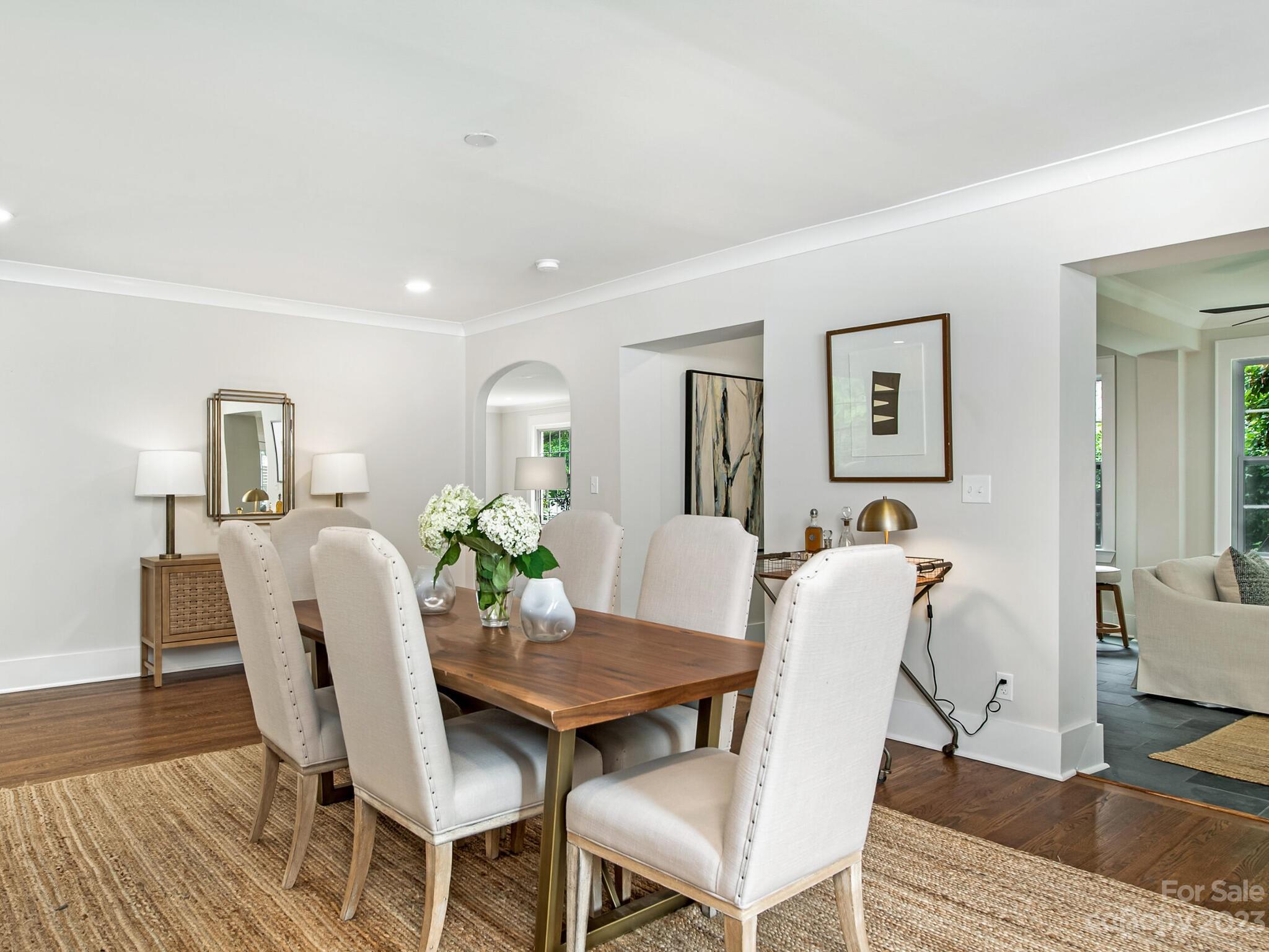 1815 Harris Road Charlotte, NC 28211 - Photo 10 of 32 a view of a dining room with furniture and wooden floor