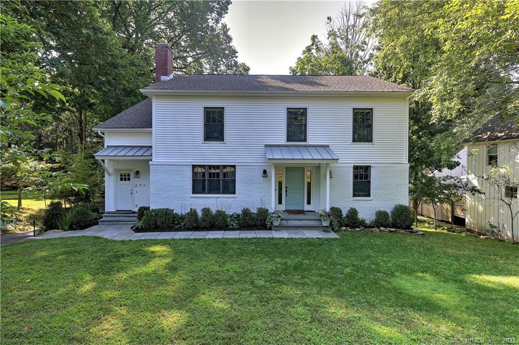 271 Barlow Road Fairfield, CT 06824 - Photo 1 of 1 a front view of house with yard and green space