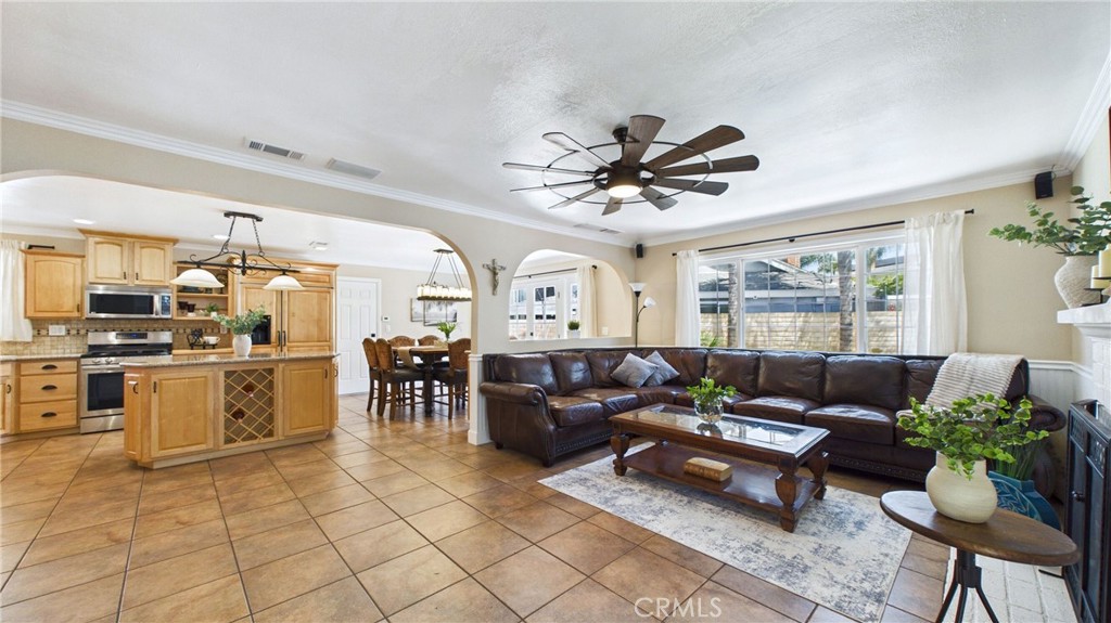 21104 Rosedell Drive Saugus, CA 91350 - Photo 12 of 33 Open-concept living area with spacious kitchen, dining space and beautiful backyard views